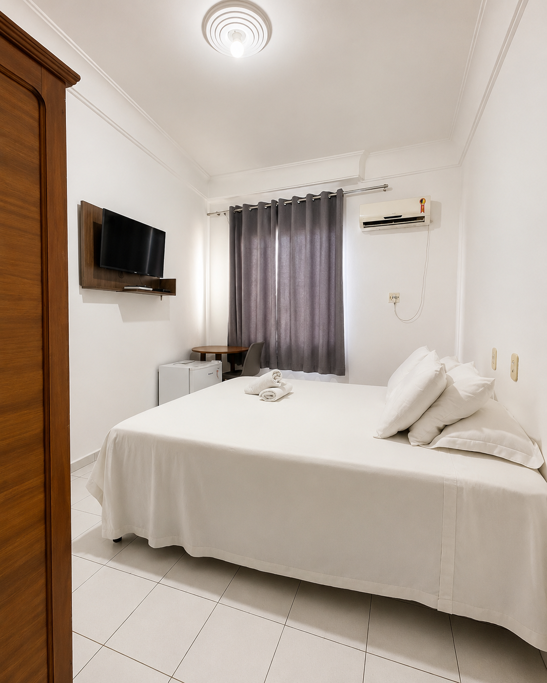 Quarto do Apartamento Econômico Luxo com cama de casal
