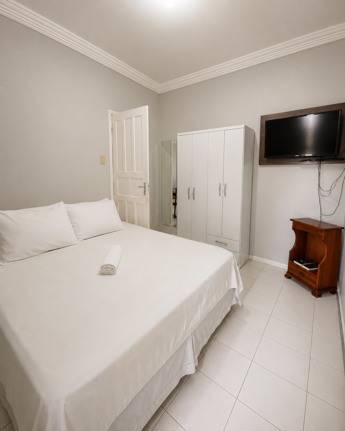Quarto do Apartamento Econômico Luxo Superior com cama de casal
